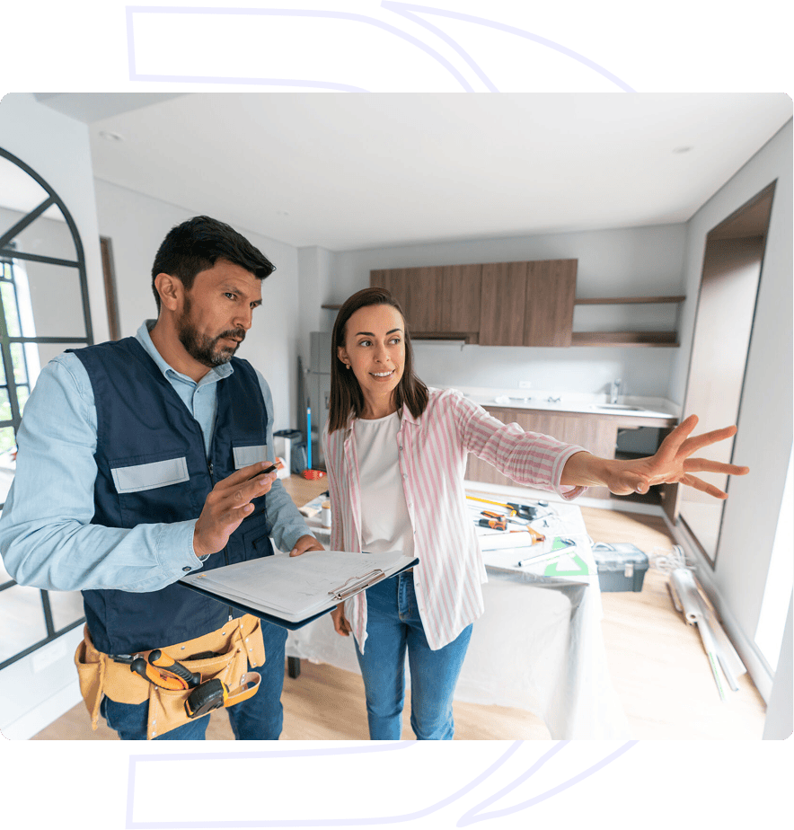 Two people discussing home renovation plans.