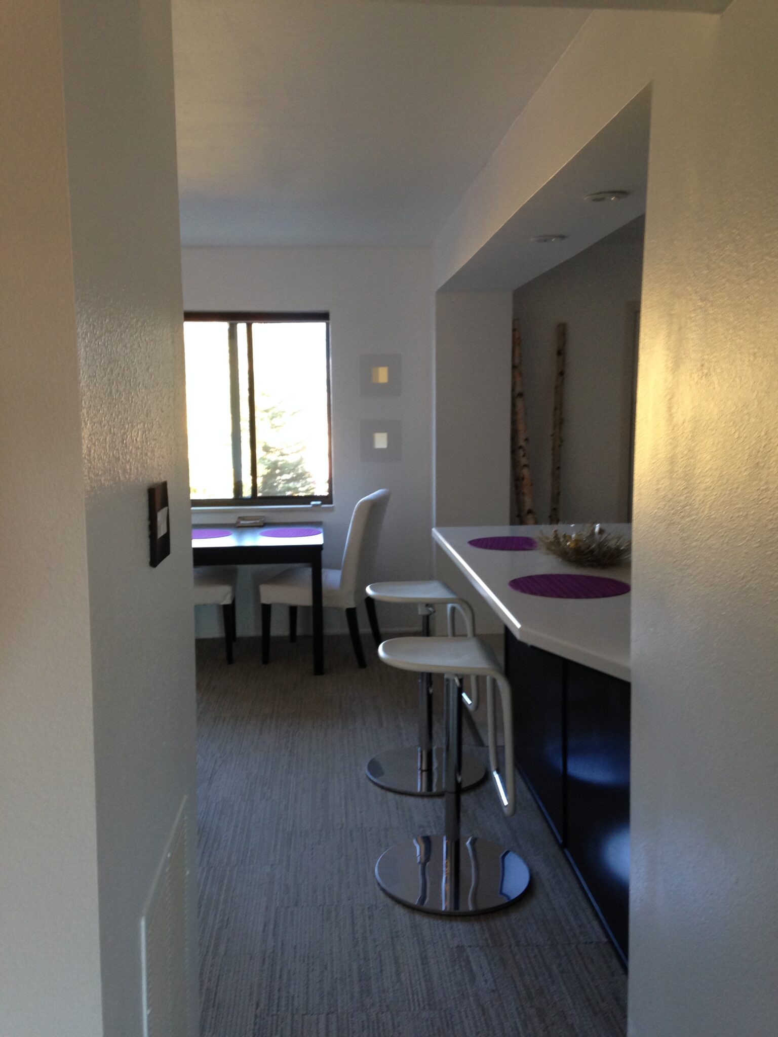 Modern kitchen with breakfast bar and stools