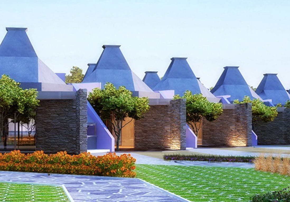 Row of modern blue-roofed villas with landscaping